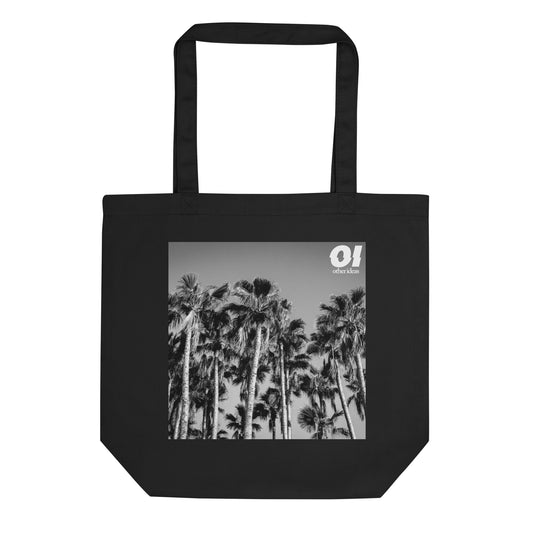 other ideas eco streetwear black organic cotton vegan tote bag with black and white palm trees photo print flat front view