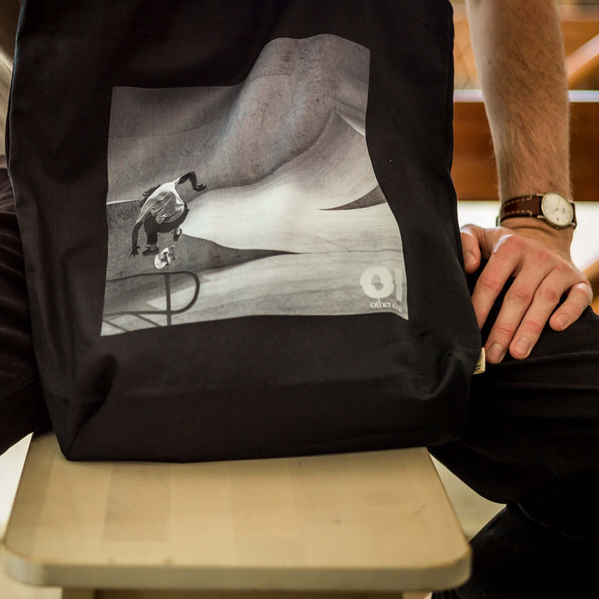 other ideas eco streetwear black organic cotton canvas streetstyle tote bag with black and white skateboarding "Jump" photo modelled front view