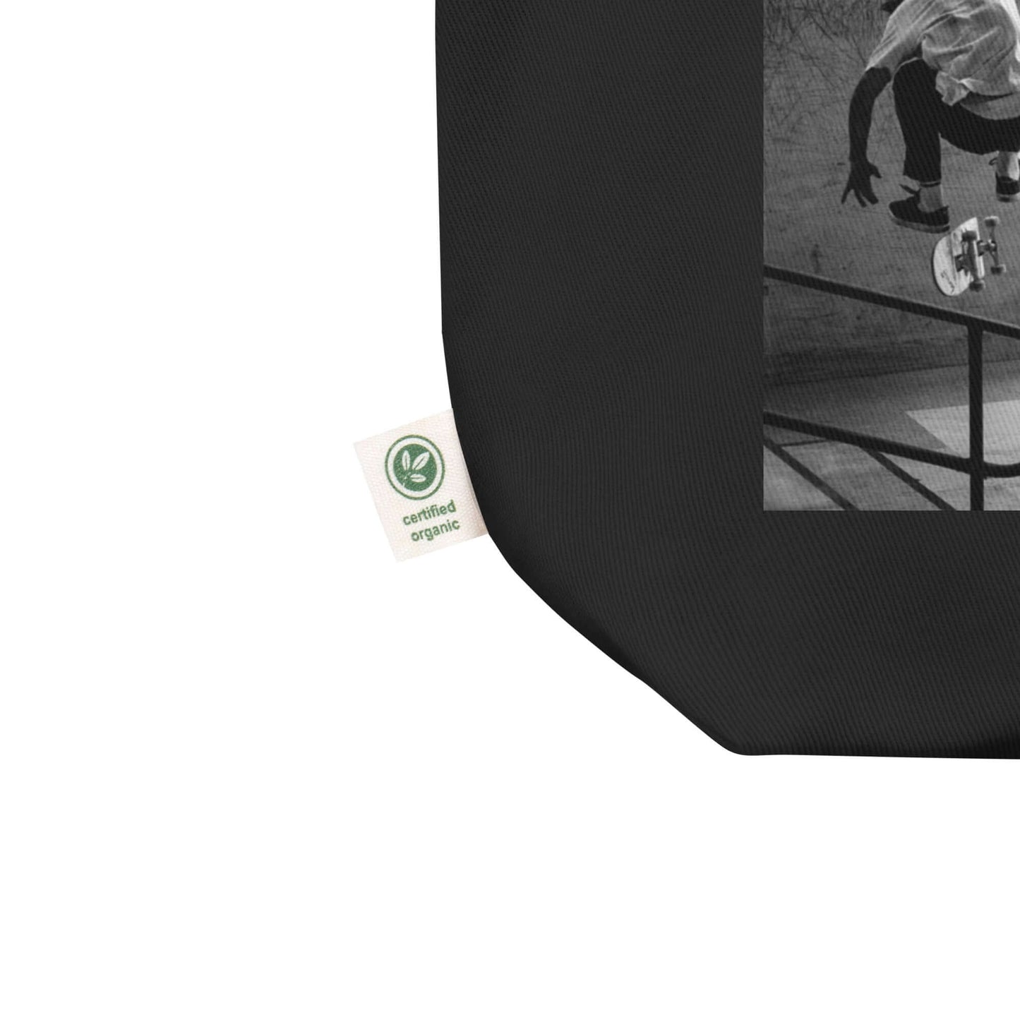 other ideas eco streetwear black organic cotton vegan tote bag with skateboarding jump photo printed flat front view zoomed with organic label detail