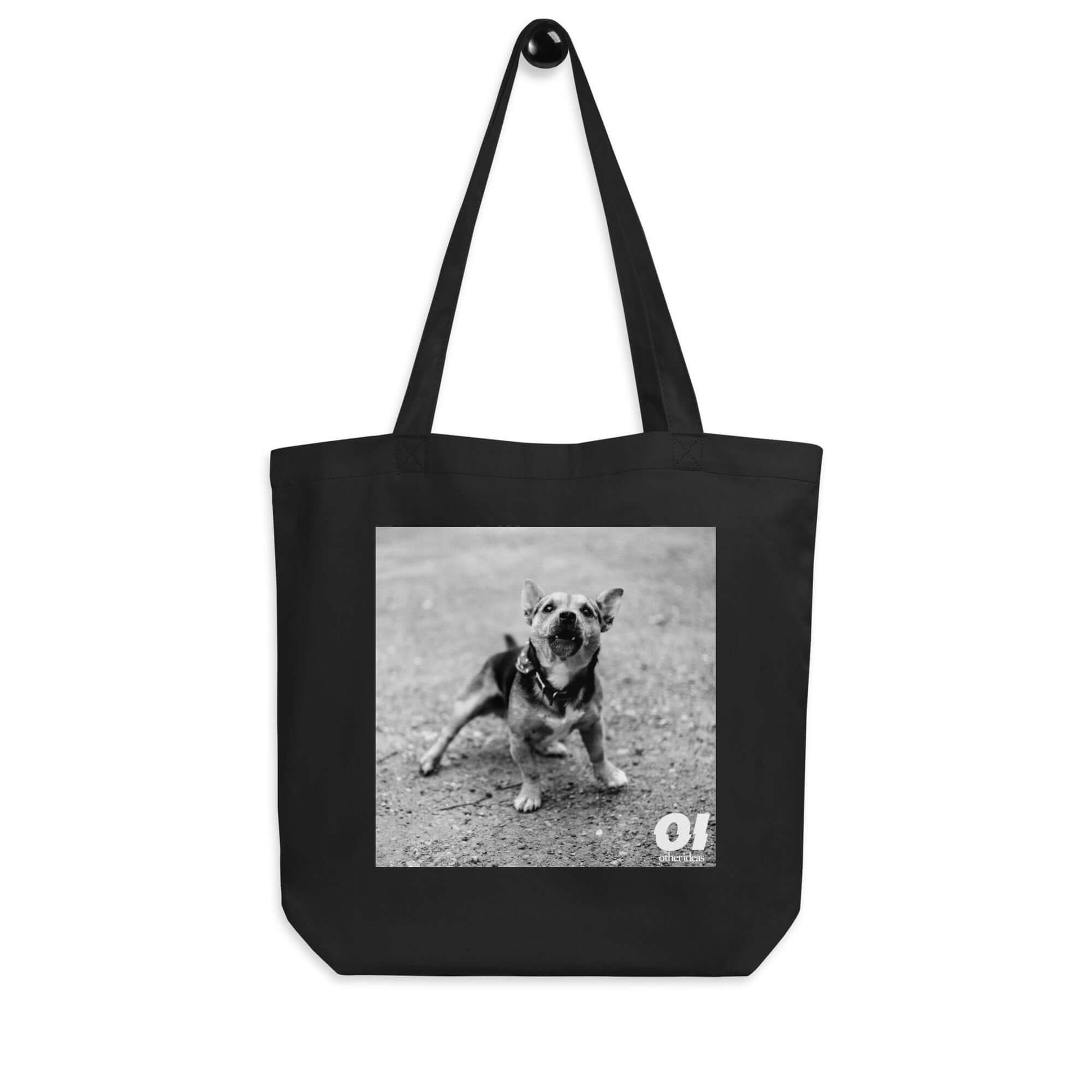 other ideas eco streetwear black organic cotton canvas streetstyle tote bag with black and white dog photo printed on hanger view