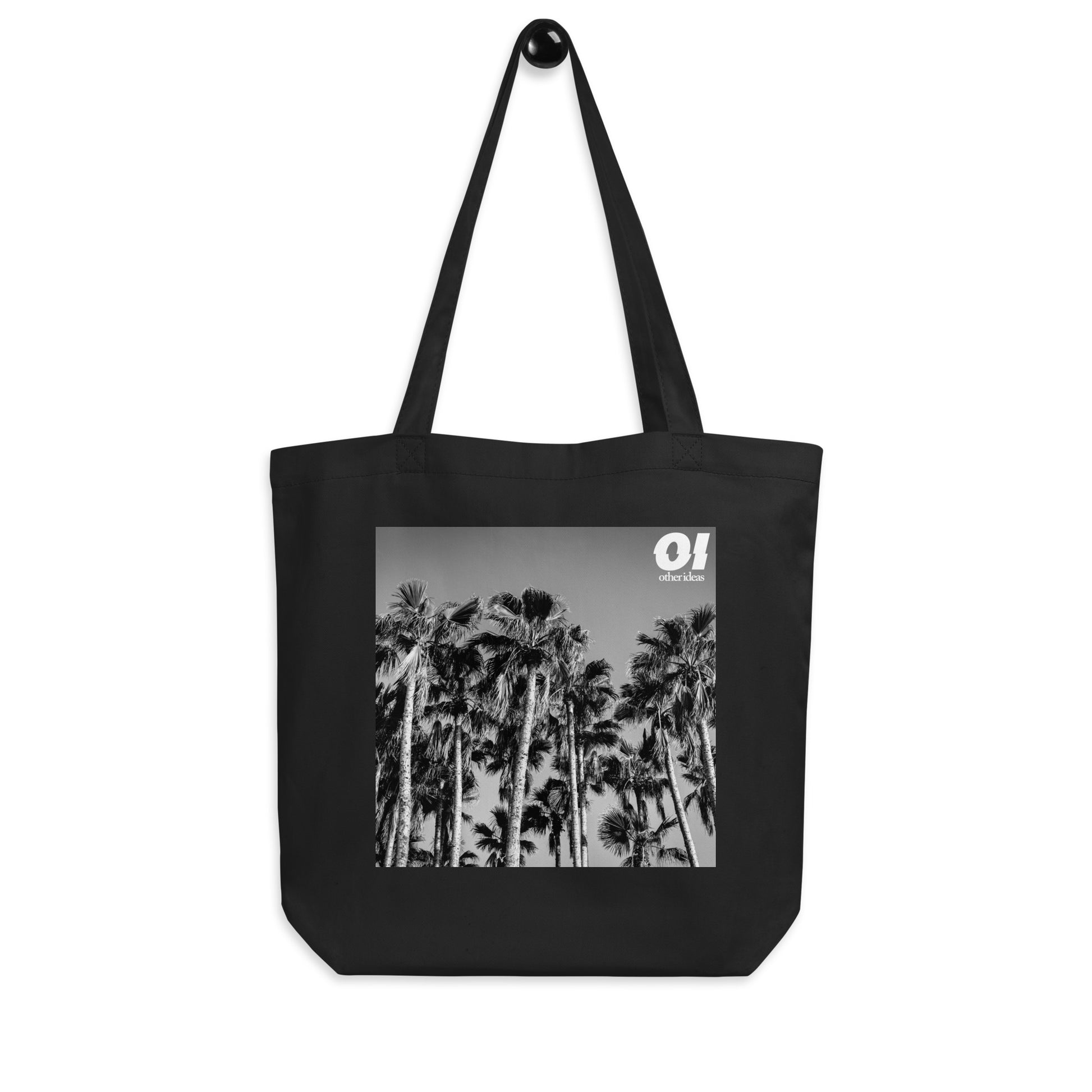 other ideas eco streetwear black organic cotton canvas streetstyle tote bag with black and white palm trees photo printed on hanger view