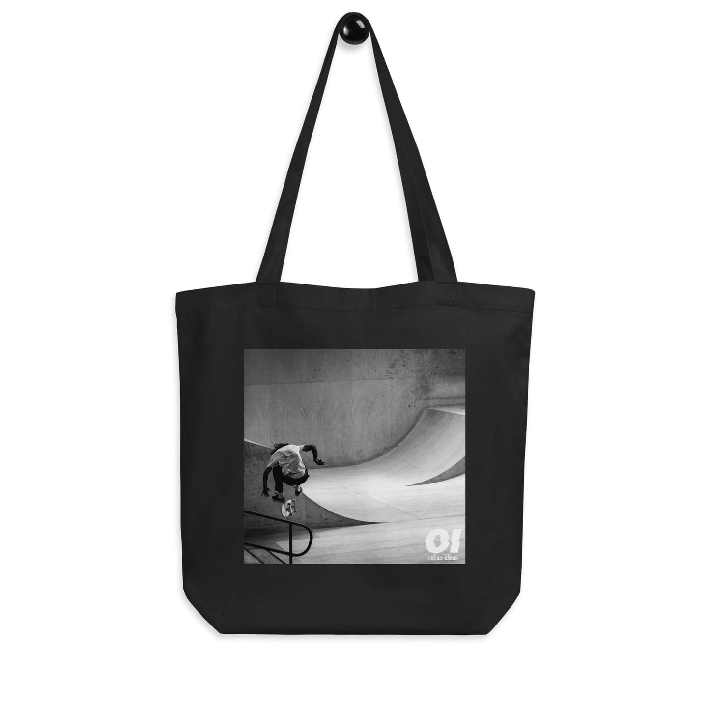 other ideas eco streetwear black organic cotton canvas streetstyle tote bag with black and white skateboarding "Jump" photo printed on hanger view