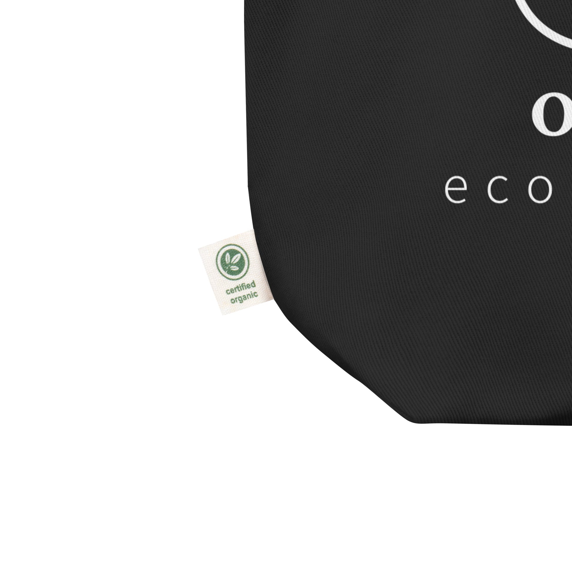 other ideas eco streetwear black organic cotton vegan tote bag with white outline logo and brand statement printed flat front view zoomed with organic label detail