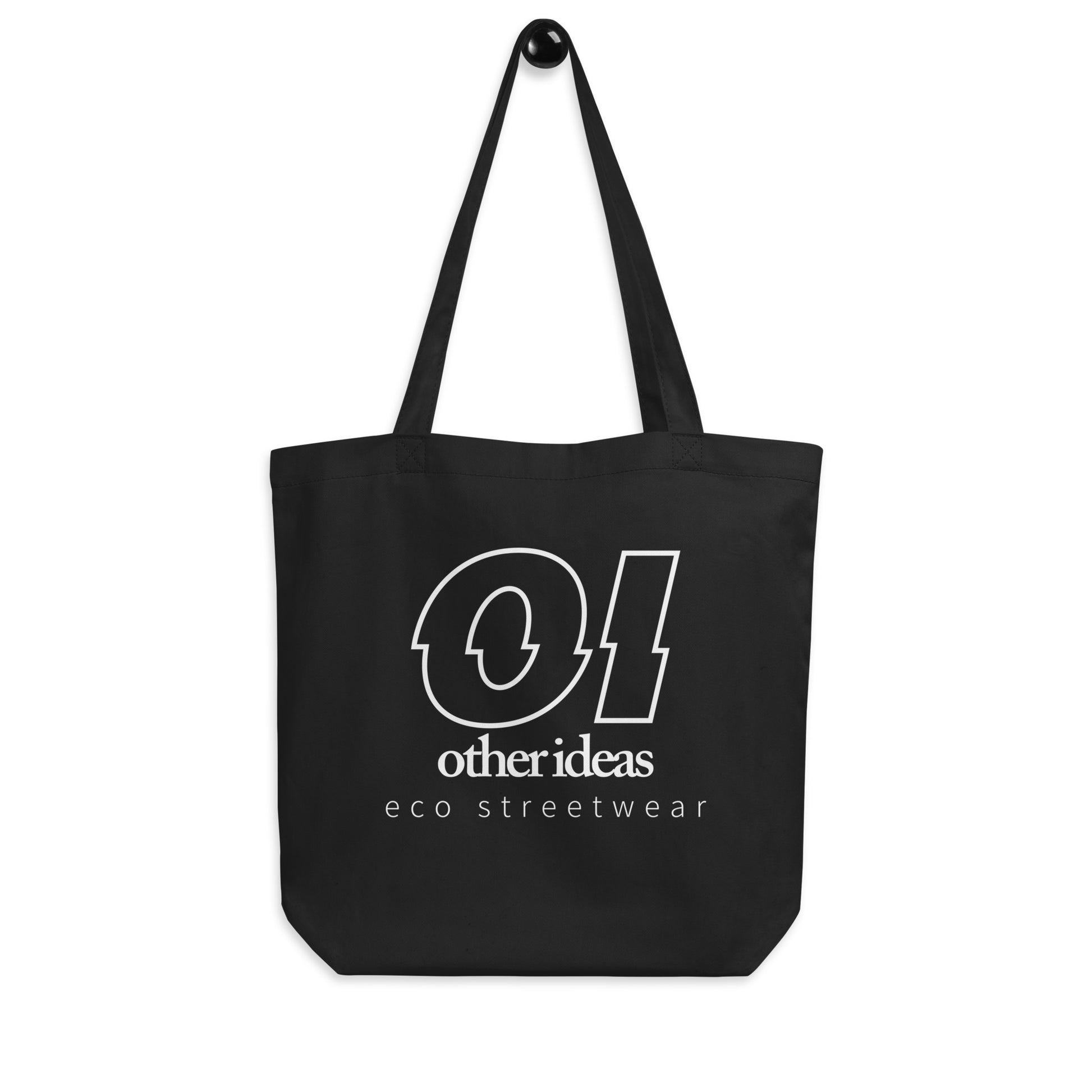 other ideas eco streetwear black organic cotton vegan tote bag with white outline logo and brand statement printed on hanger view