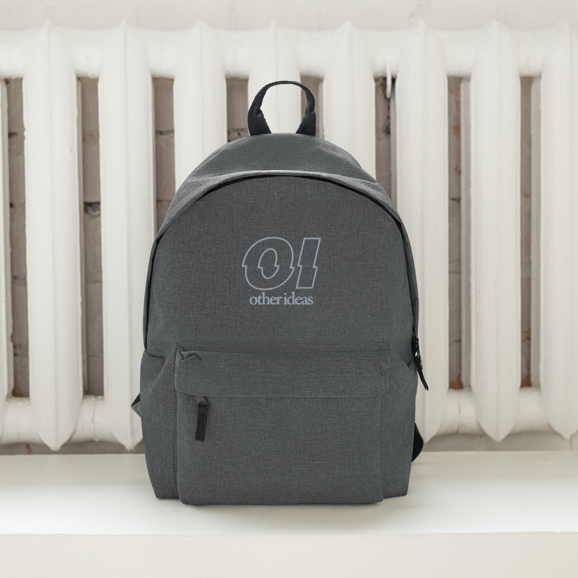 other ideas eco streetwear grey marl outline logo embroidered sustainably made slow fashion backpack lifestyle front view