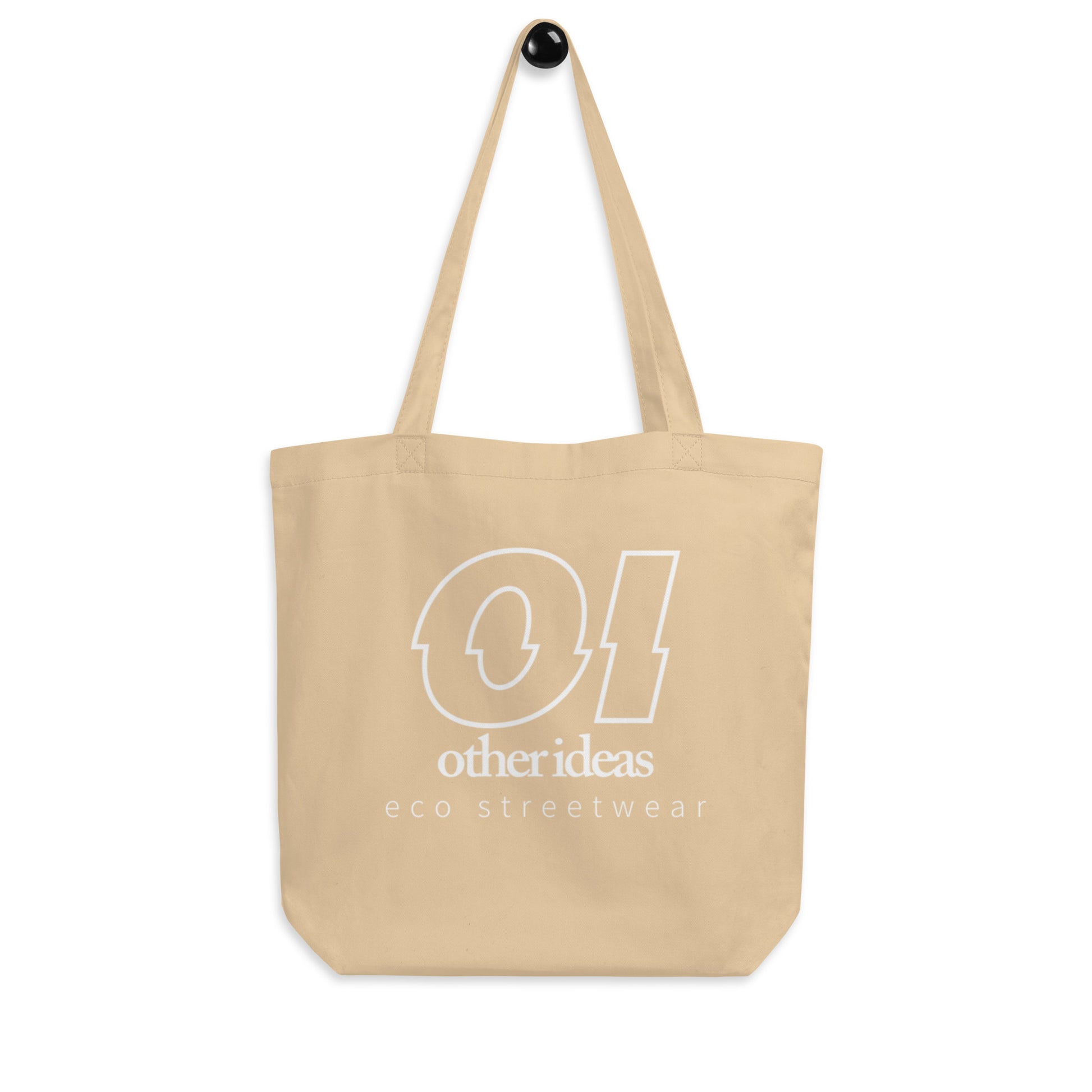 other ideas eco streetwear natural oyster organic cotton vegan tote bag with white outline logo and brand statement printed on hanger view