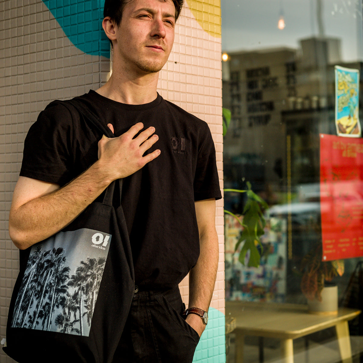 other ideas eco streetwear natural oyster organic cotton vegan tote bag with black and white palm trees photo print modelled view 2