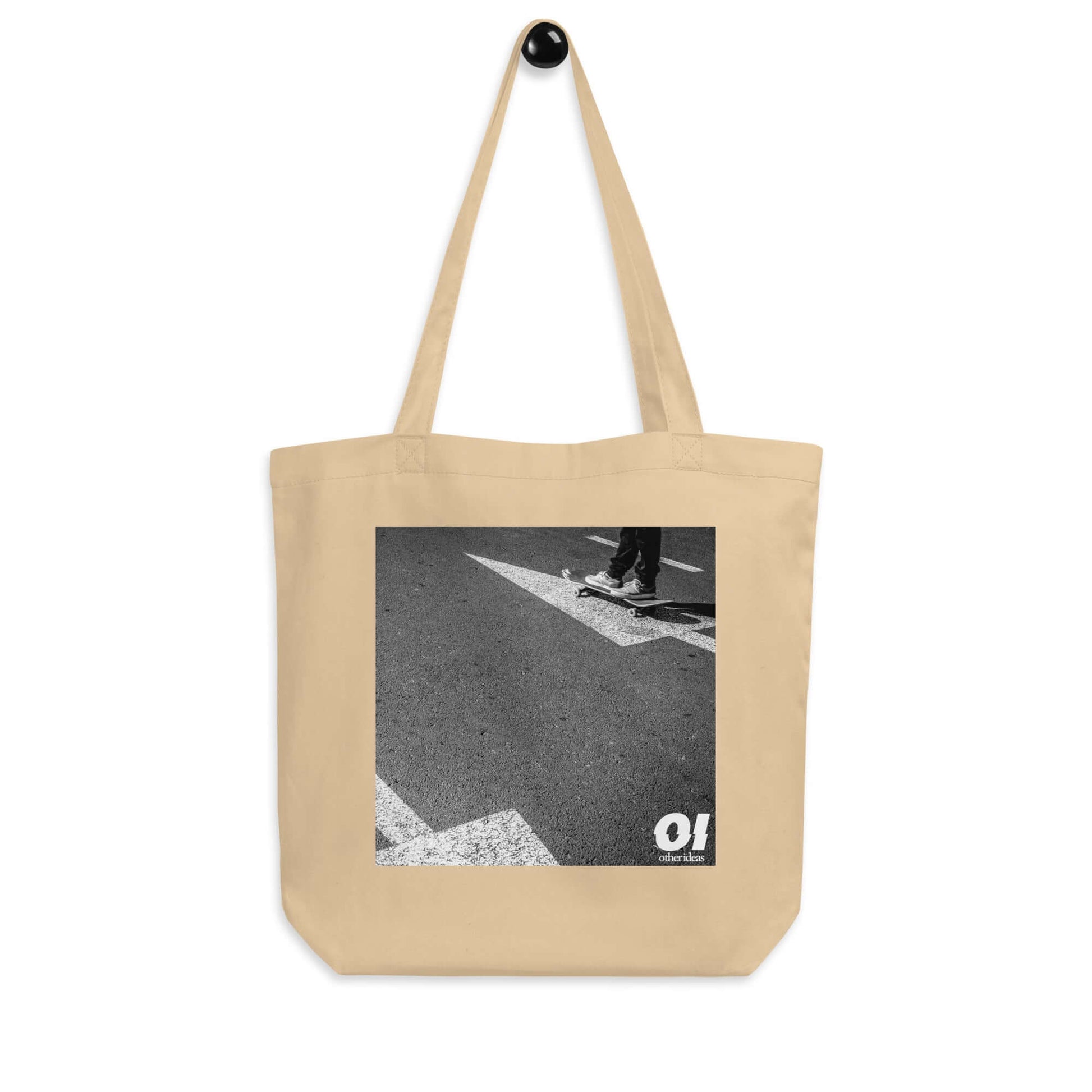 other ideas eco streetwear natural oyster organic cotton canvas streetstyle tote bag with black and white skateboarding arrows photo printed on hanger view