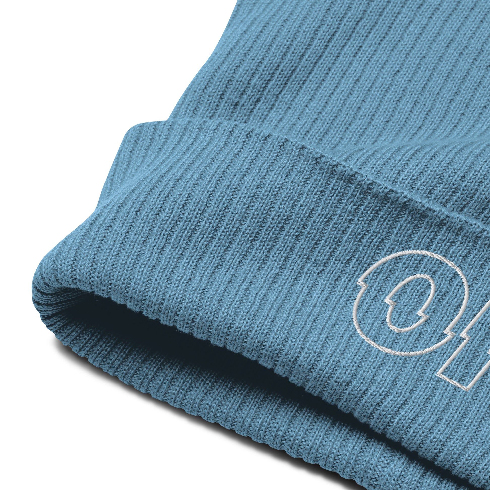 other ideas eco streetwear light avio blue organic cotton ribbed beanie sustainable slow fashion view showing ribbed fabric and embroidery logo detail